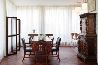 Eclectic Apartment Dining Room. Berlin Apartment by Robert Couturier, Inc..
