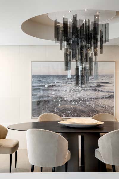 Modern Apartment Dining Room. Lakeview Penthouse by Elizabeth Metcalfe Design.