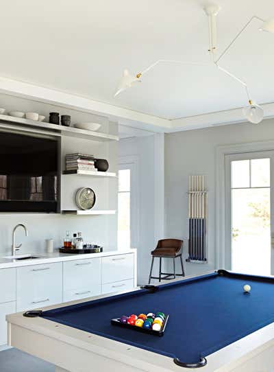  Mid-Century Modern Scandinavian Family Home Bar and Game Room. Quogue by Tina Ramchandani Creative LLC.