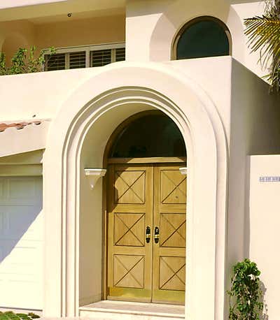  Mediterranean Vacation Home Exterior. Townhouse F by Jerry Jacobs Design.