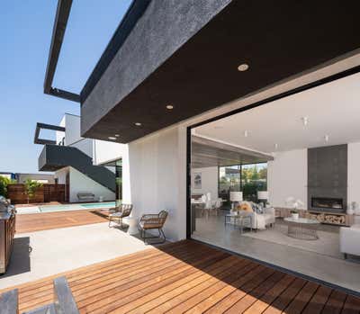  Industrial Beach House Exterior. Walnut by VerteX Design Studio.