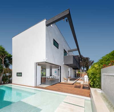  Minimalist Industrial Beach House Exterior. Walnut by VerteX Design Studio.
