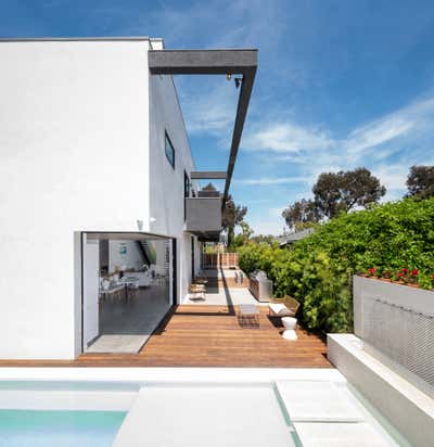 Minimalist Beach House Exterior. Walnut by VerteX Design Studio.