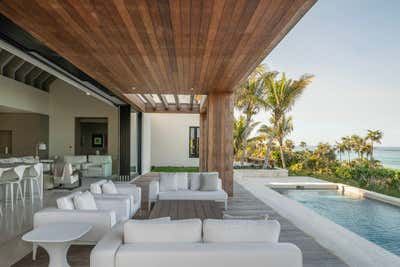 Contemporary Beach House Patio and Deck. Bakers Bay, Bahamas by KMH Design.