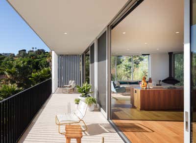  Mid-Century Modern Minimalist Family Home Patio and Deck. Athina Project  by Michael Hilal.