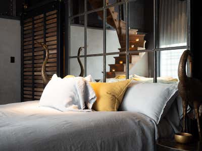  Industrial Apartment Bedroom. Caroale  by Stewart + Stewart Design.