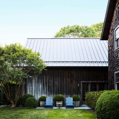  Transitional Maximalist Country House Exterior. East Hampton Country Home by Robert Stilin.