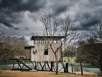  Rustic Exterior. Cypress Lakehouse & Treehouse  by Fern Santini, Inc..