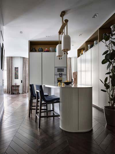  Modern Kitchen. Step Inside an Art Collector's Apartment by O&A Design Ltd.