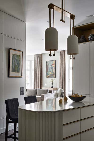  Modern Kitchen. Step Inside an Art Collector's Apartment by O&A Design Ltd.