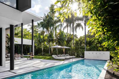  Tropical Family Home Exterior. Coconut Grove Modern by Collarte Interiors.