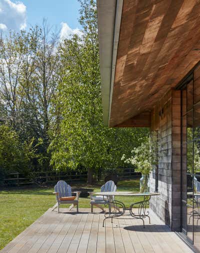  English Country Patio and Deck. The Pavilion by Kate Guinness Design.