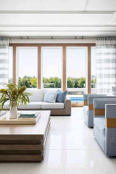  Minimalist Living Room. Deal Beach House | A Generational Haven  by Ovadia Design Group.