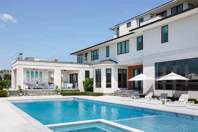  Beach Style Beach House Exterior. Deal Beach House | A Generational Haven  by Ovadia Design Group.