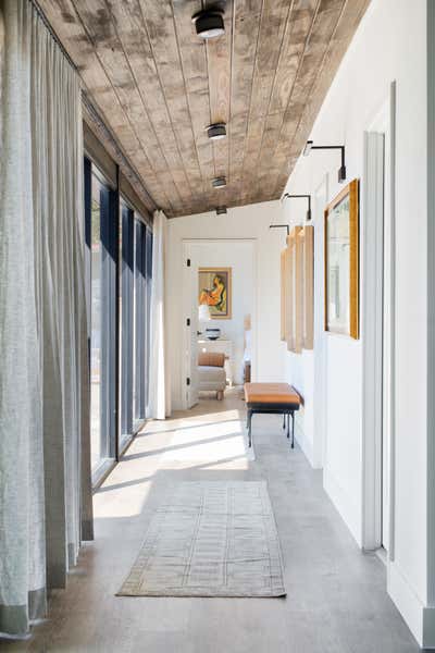  Eclectic Entry and Hall. Bee Caves Mid Century by The Pankonien Group.