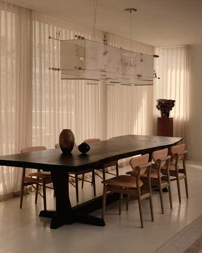 Minimalist Dining Room. Cast Iron House  by Studio Zuchowicki, LLC.
