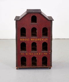 Tradesign in the Form of a Brick Storehouse