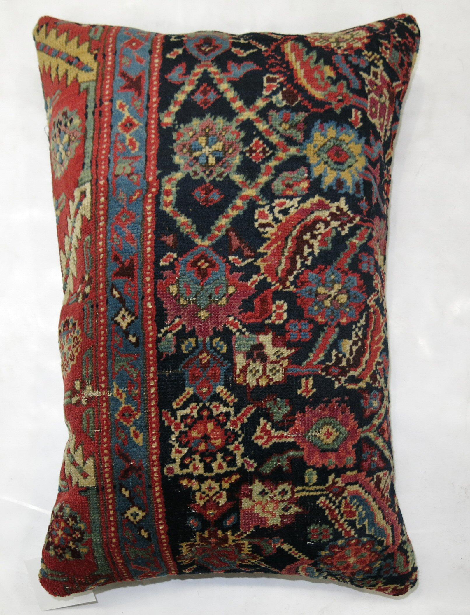 Pillow made from a 20th-century Persian Mahal Rug.

Measures: 15'' x 21''.