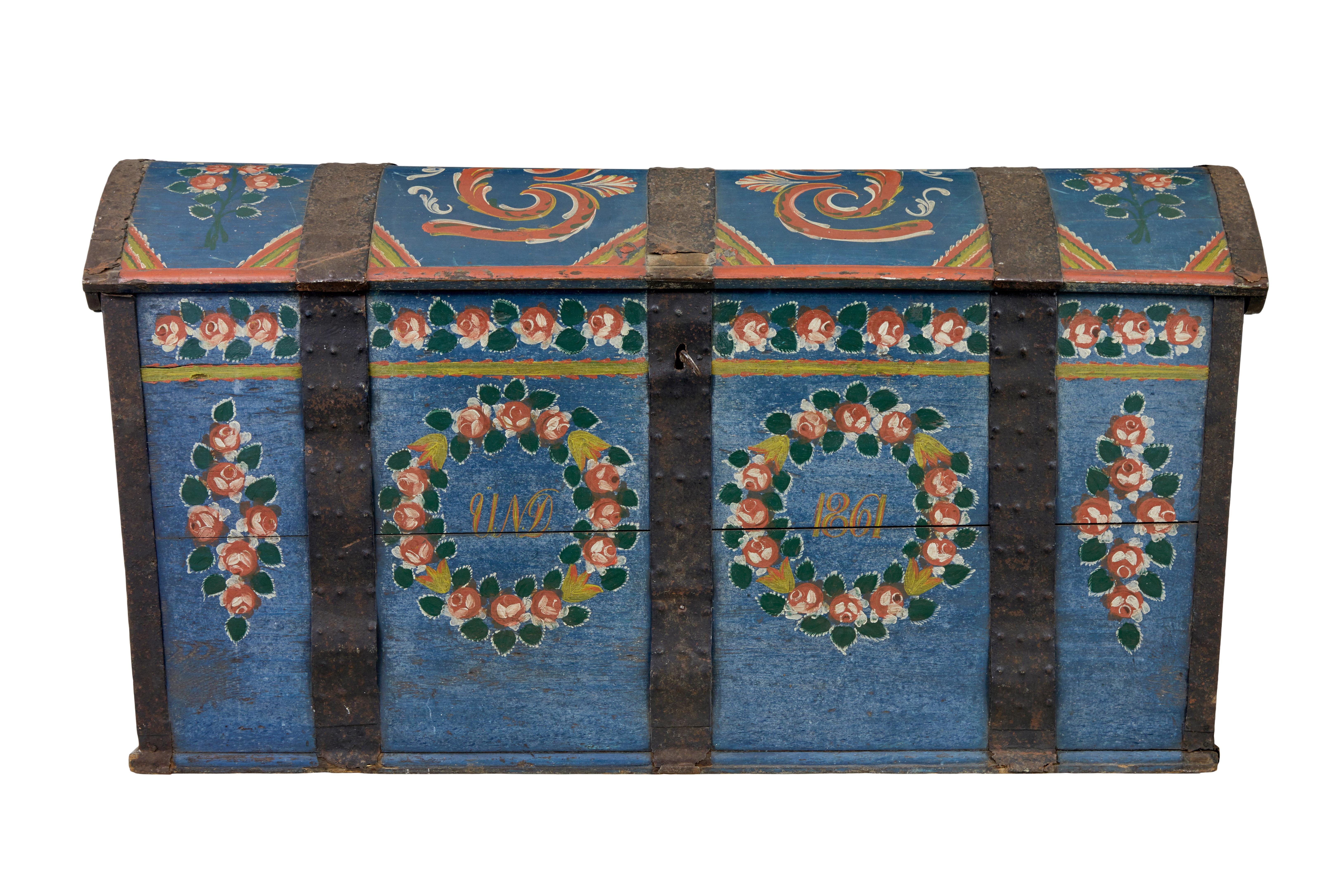 Traditional 19th century painted Swedish dome trunk circa 1861.

Hand painted and dated 1861, but chest is older as they are often given away as marriage gifts.

Made from oak rather than the usual pine.  Dome top with original metal strap work