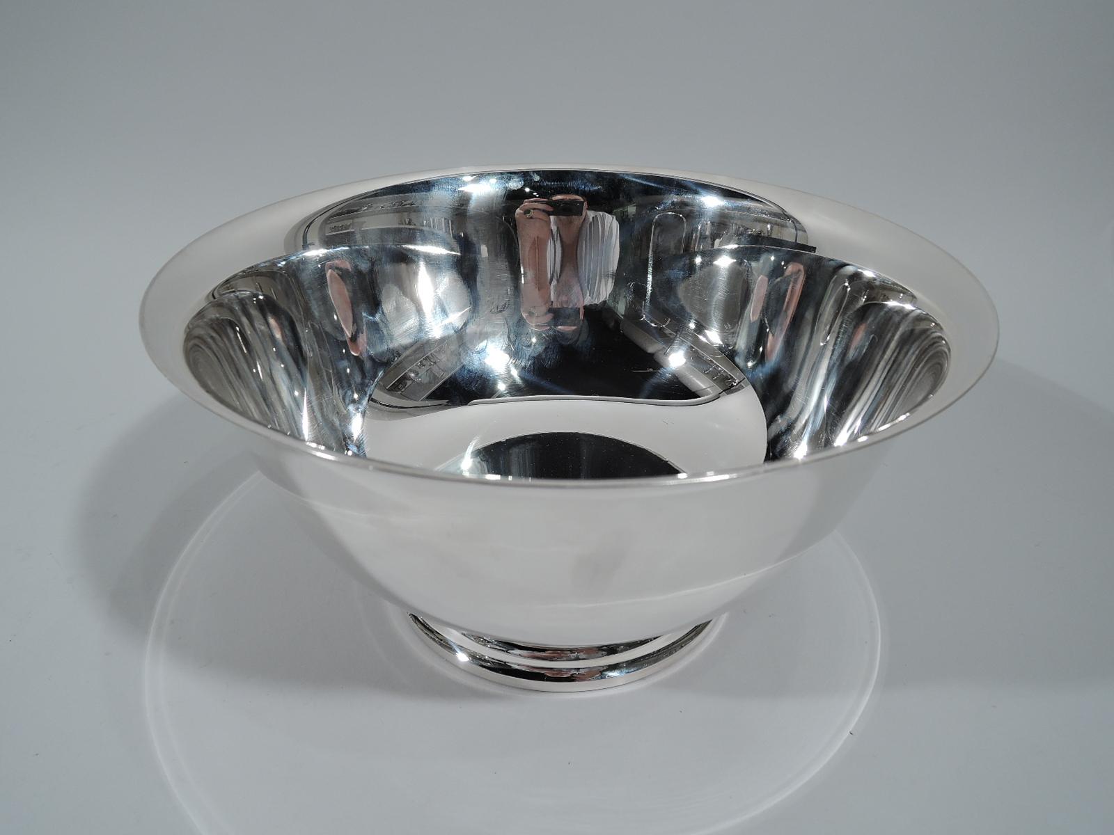 Traditional sterling silver Revere bowl. Made by Gorham in Providence in 1957. Curved sides, flared rim, and raised foot. The classic form with lots of room for engraving. Hallmark includes date code, no. 41660, and phrase “P. Revere /