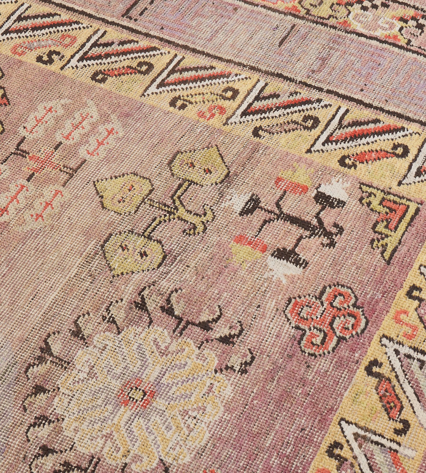 Traditioneller antiker handgeknüpfter Khotan-Teppich (Wolle) im Angebot