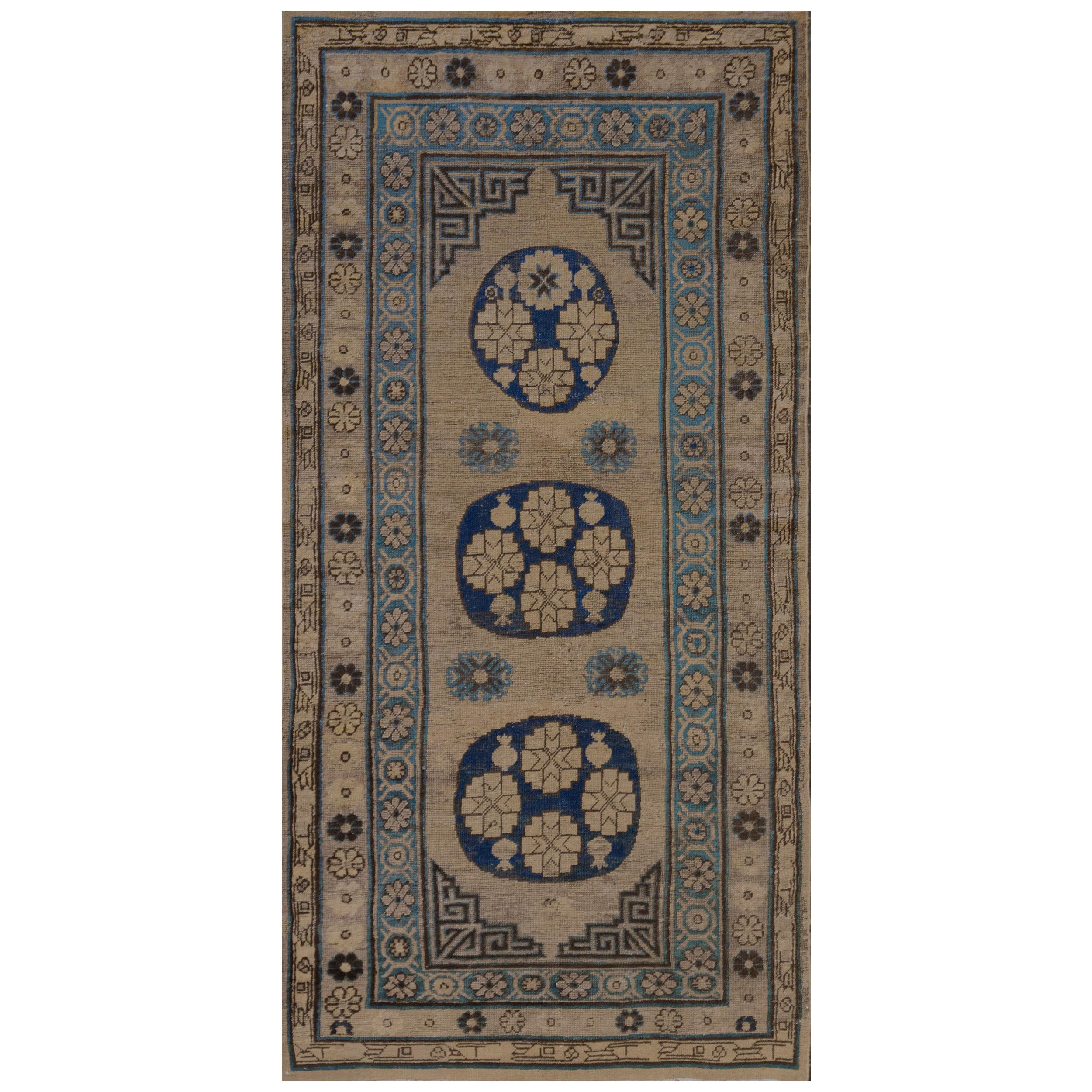 Traditional Antique Handwoven Wool Persian Khotan Runner For Sale