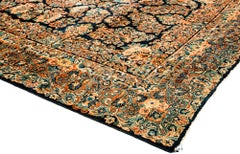 Traditional Antique Persian Sarouk Rug with Dark Blue Field and a Floral Pattern