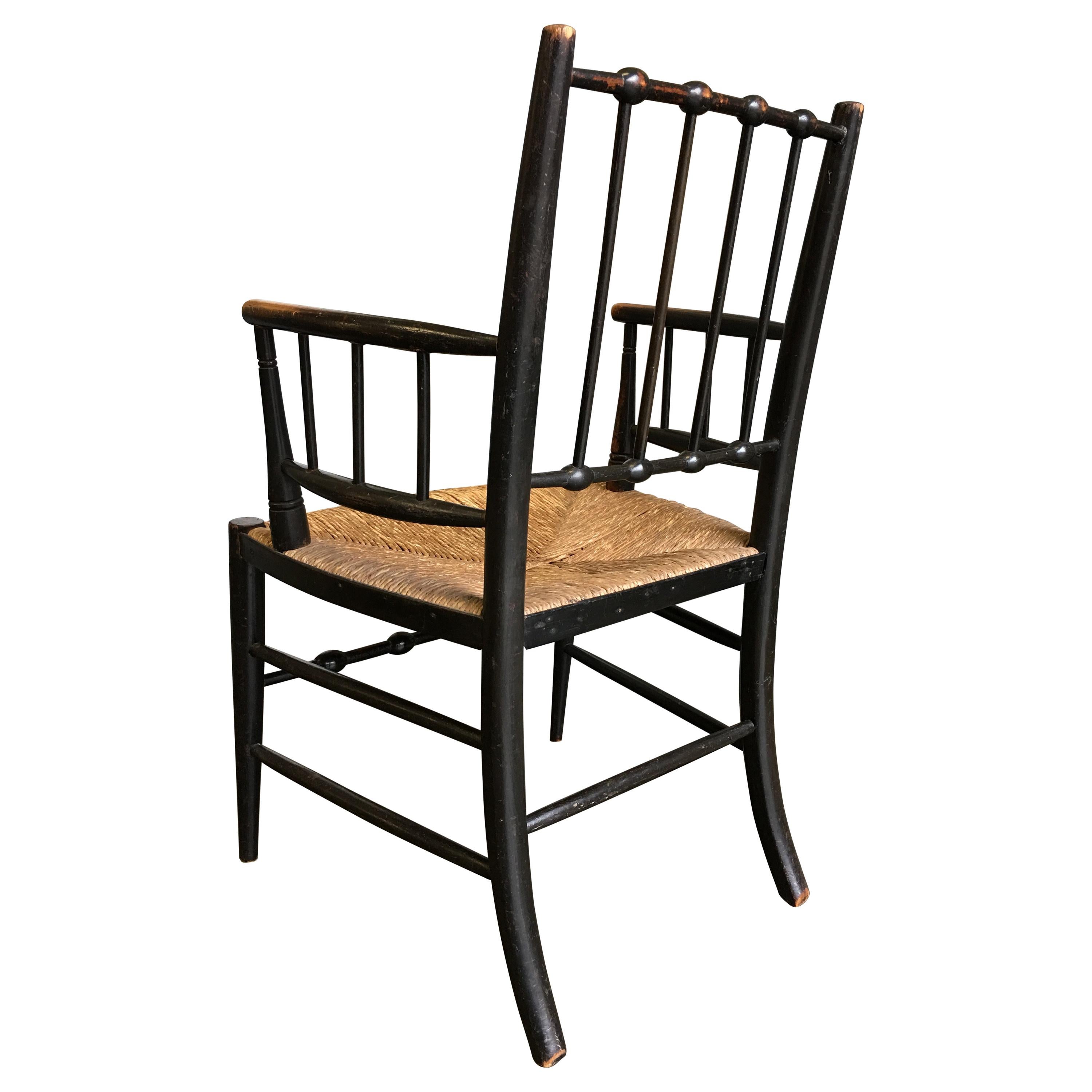 Traditional Antique Sussex Armchair in Ebonised Beech or Ash with Rush Seat For Sale