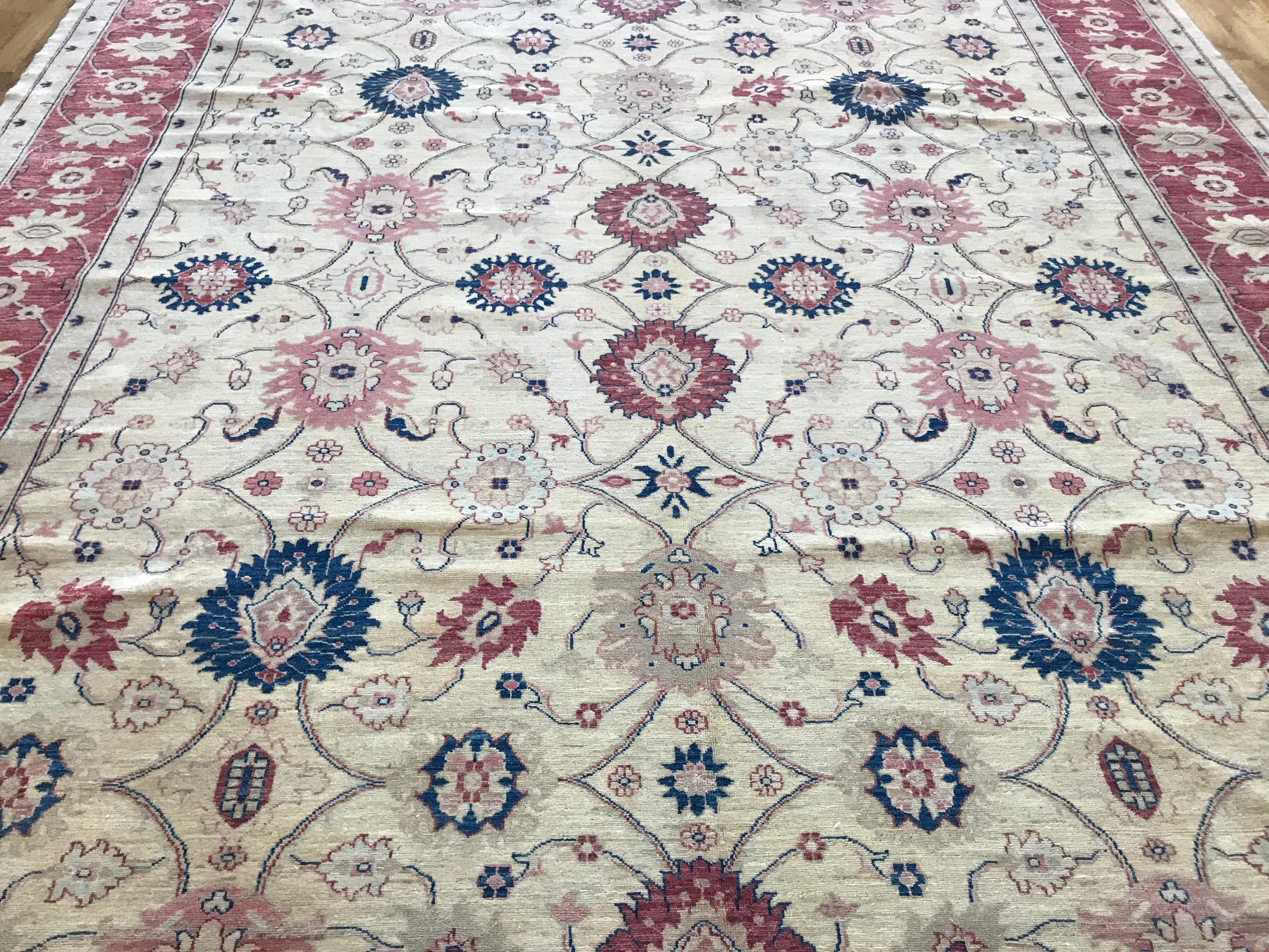 Hand-Knotted Traditional Area Rug with Red Border For Sale