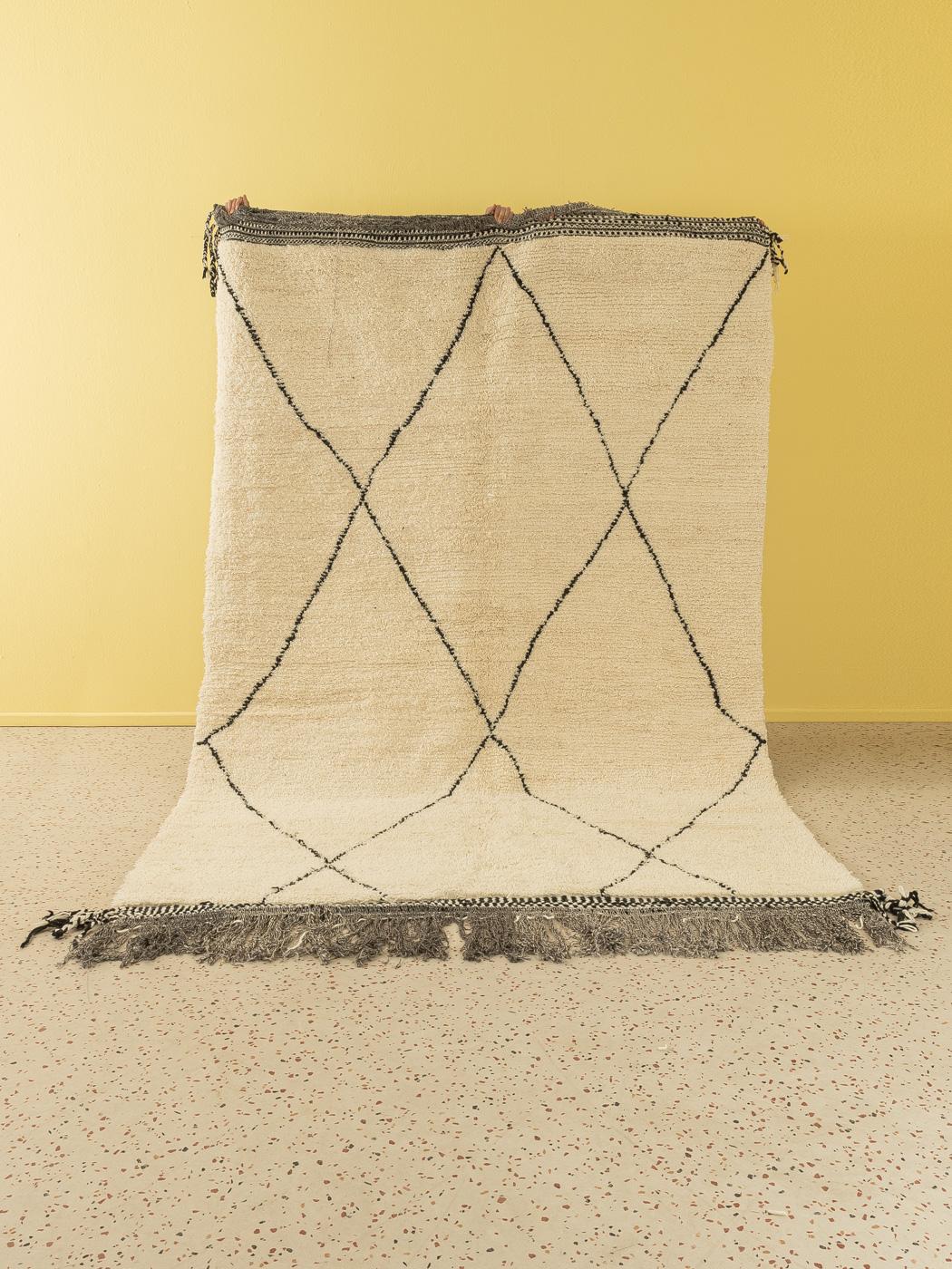 Traditional Beni is a contemporary 100% wool rug – thick and soft, comfortable underfoot. Our Berber rugs are handwoven and handknotted by Amazigh women in the Atlas Mountains. These communities have been crafting rugs for thousands of years. One