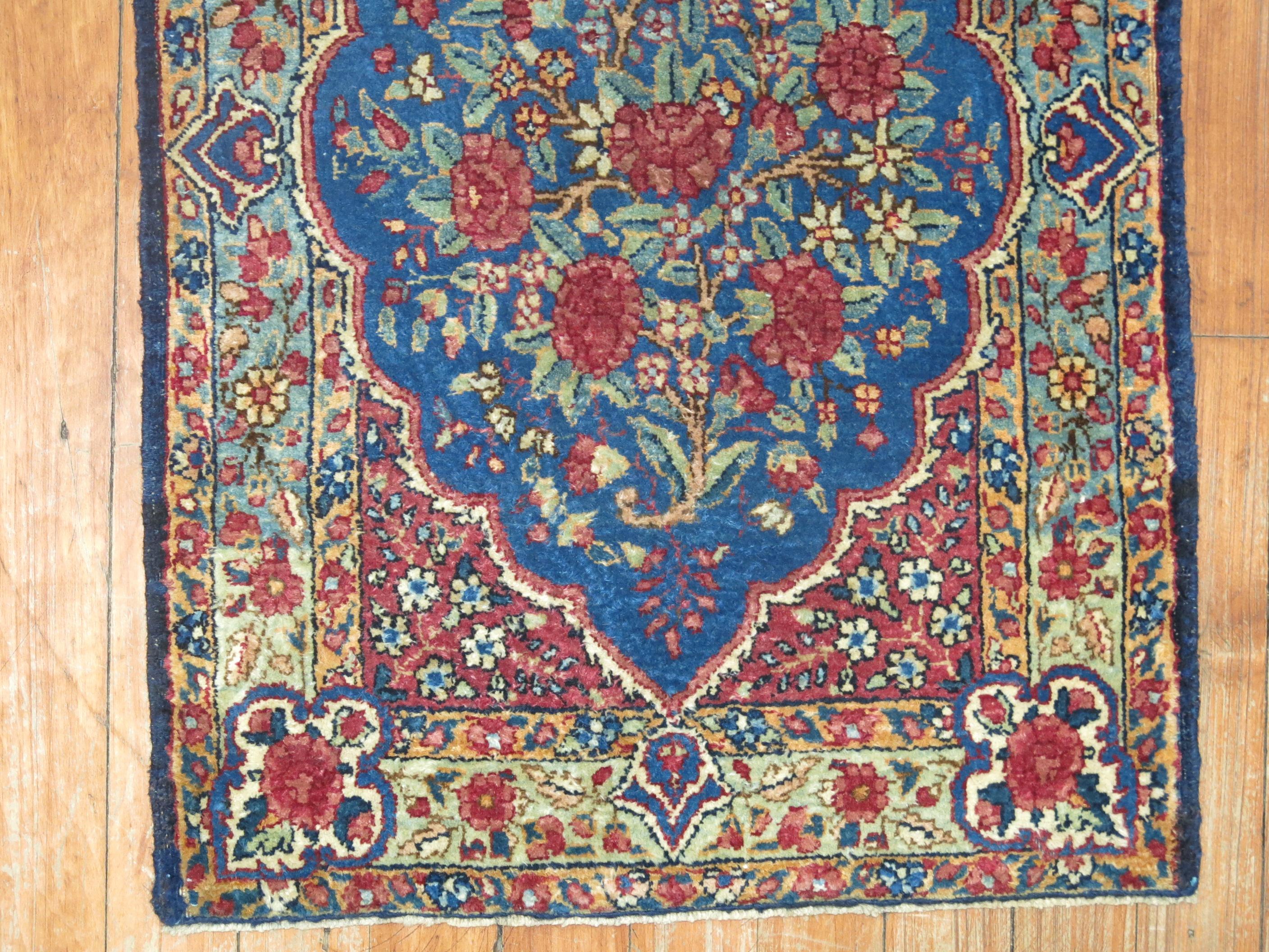 An early 20th century Persian Lavar Kerman traditional mat size rug.

Measures: 1'6