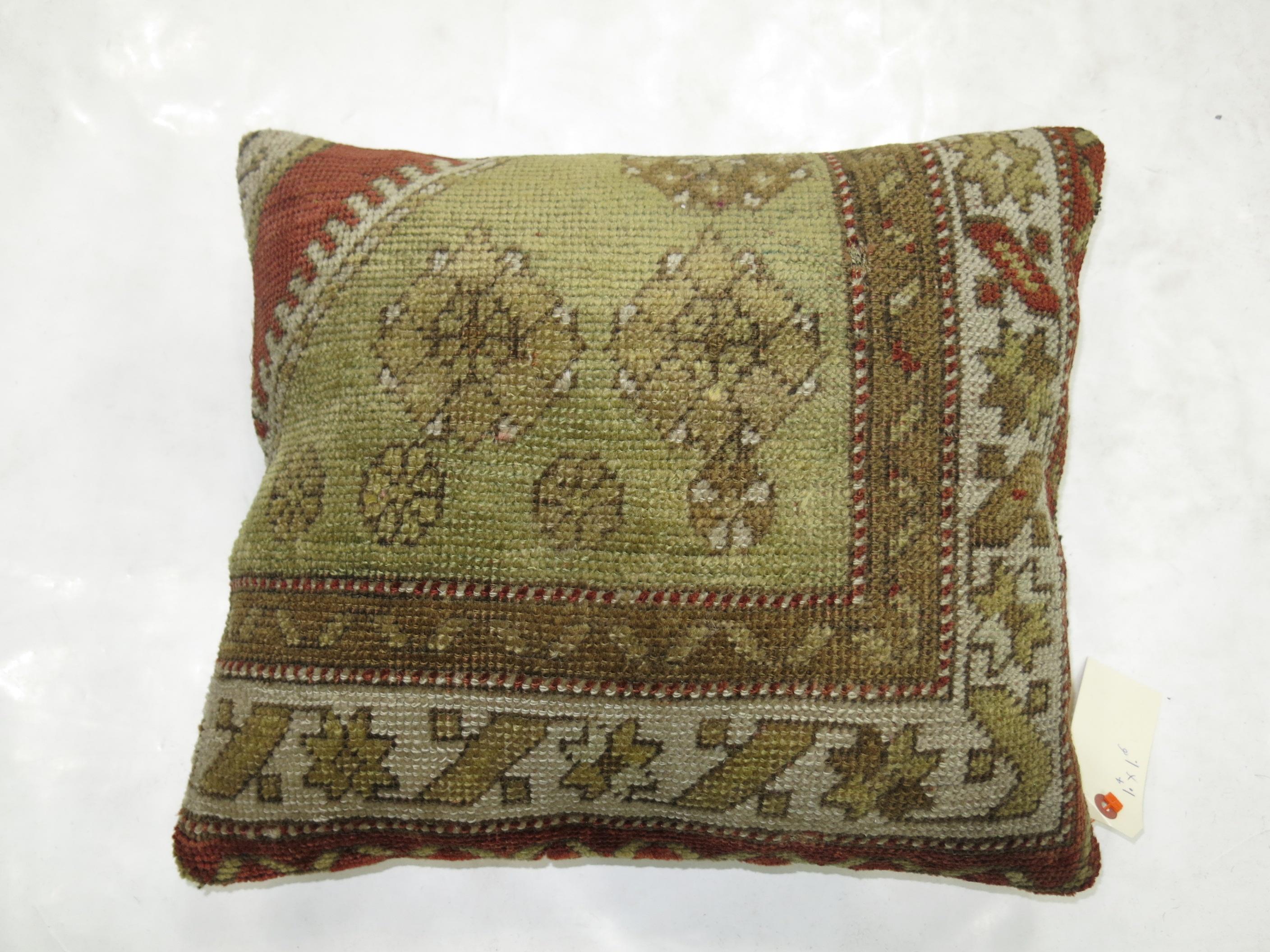 One-of-a-kind rug pillow made from a vintage Turkish Oushak with cotton back and zipper closure.

Measures: 16'' x 18''.
    