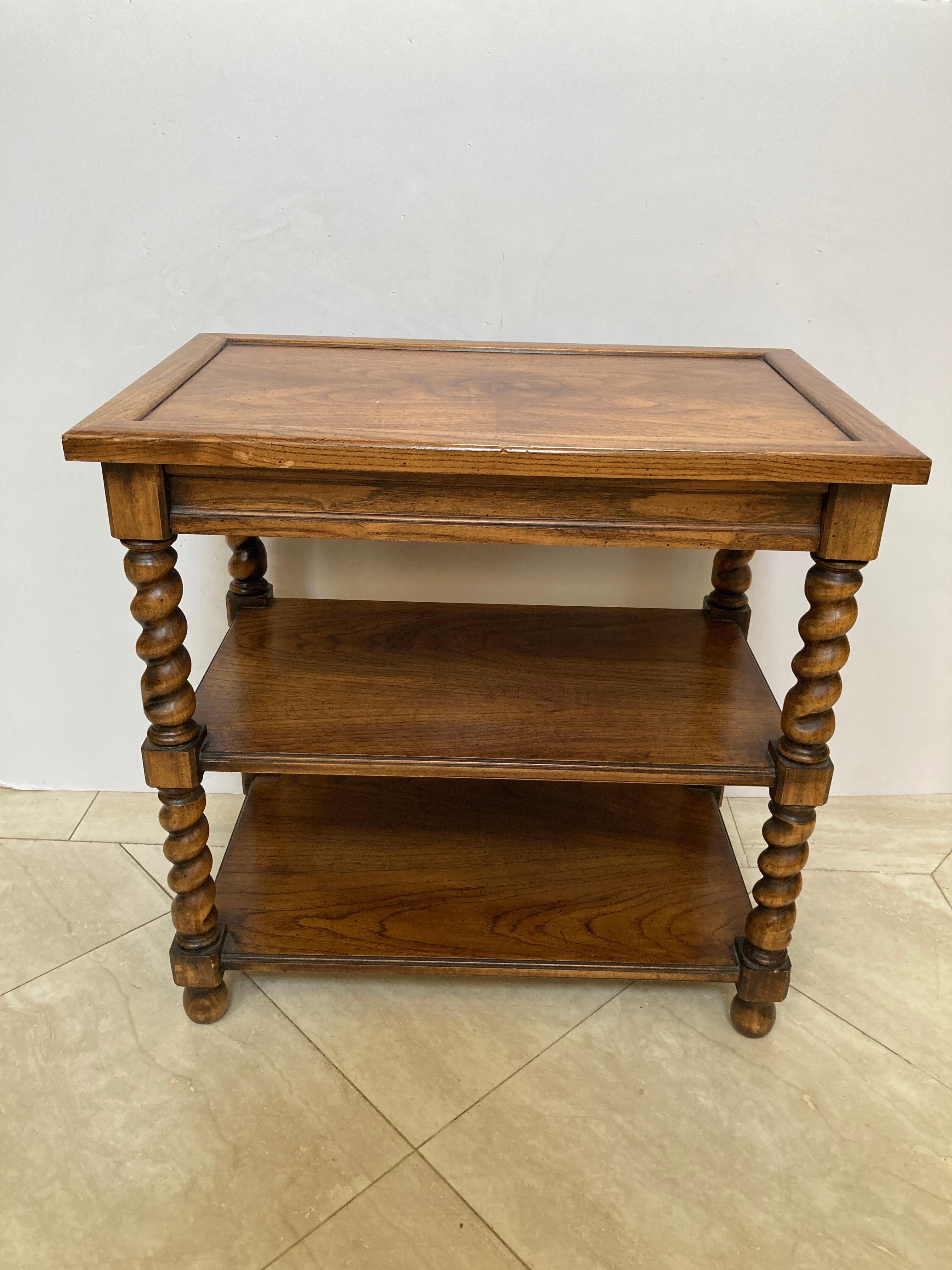 Brandt furniture three-tier side table. 
20th century traditional Brandt Furniture Monastique collection accent end table 
Quality hardwood side table, barley twist posts support. 
Measures: 25.5