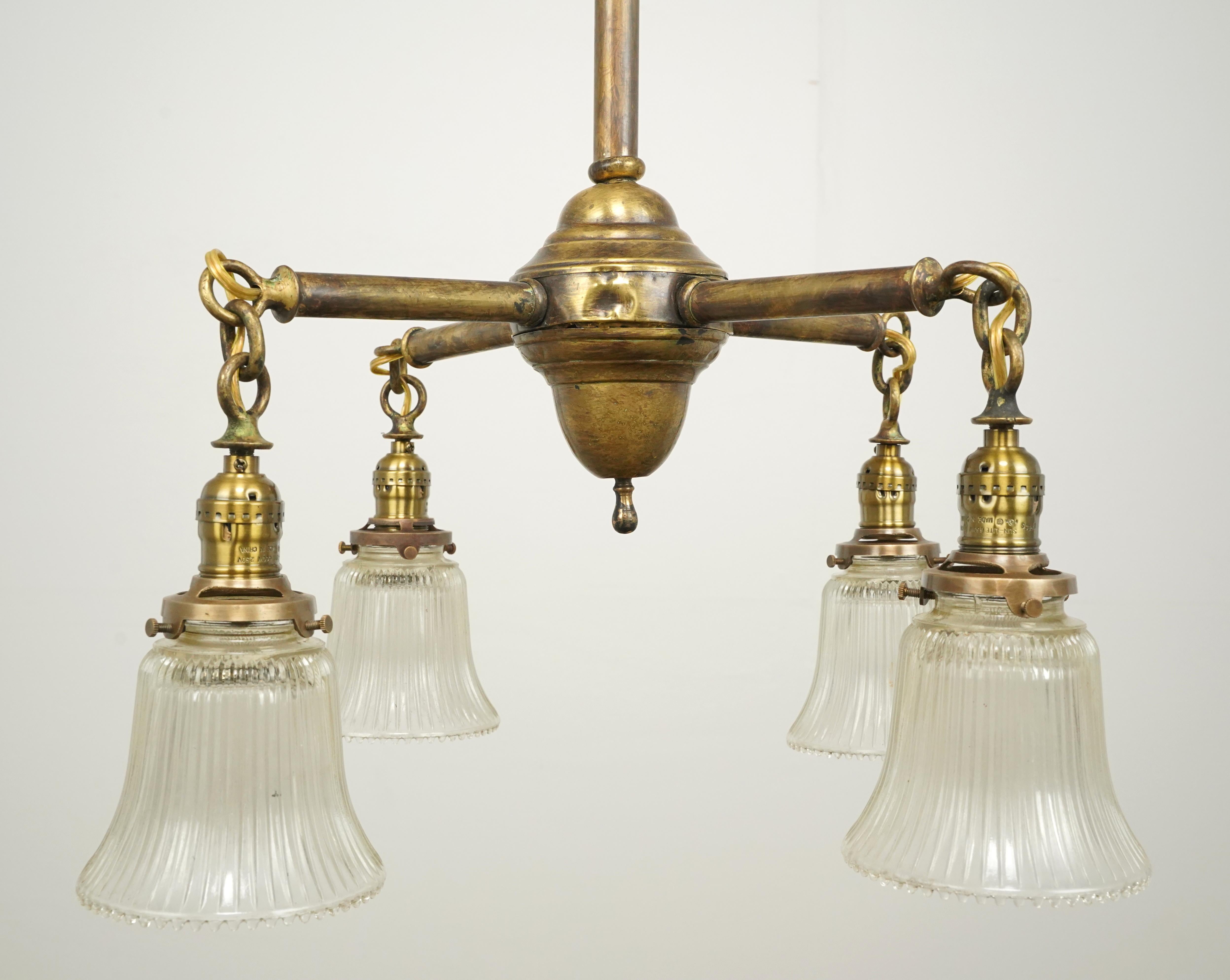 Traditional Brass 4 Arm Glass Shades Pole Chandelier In Good Condition For Sale In New York, NY