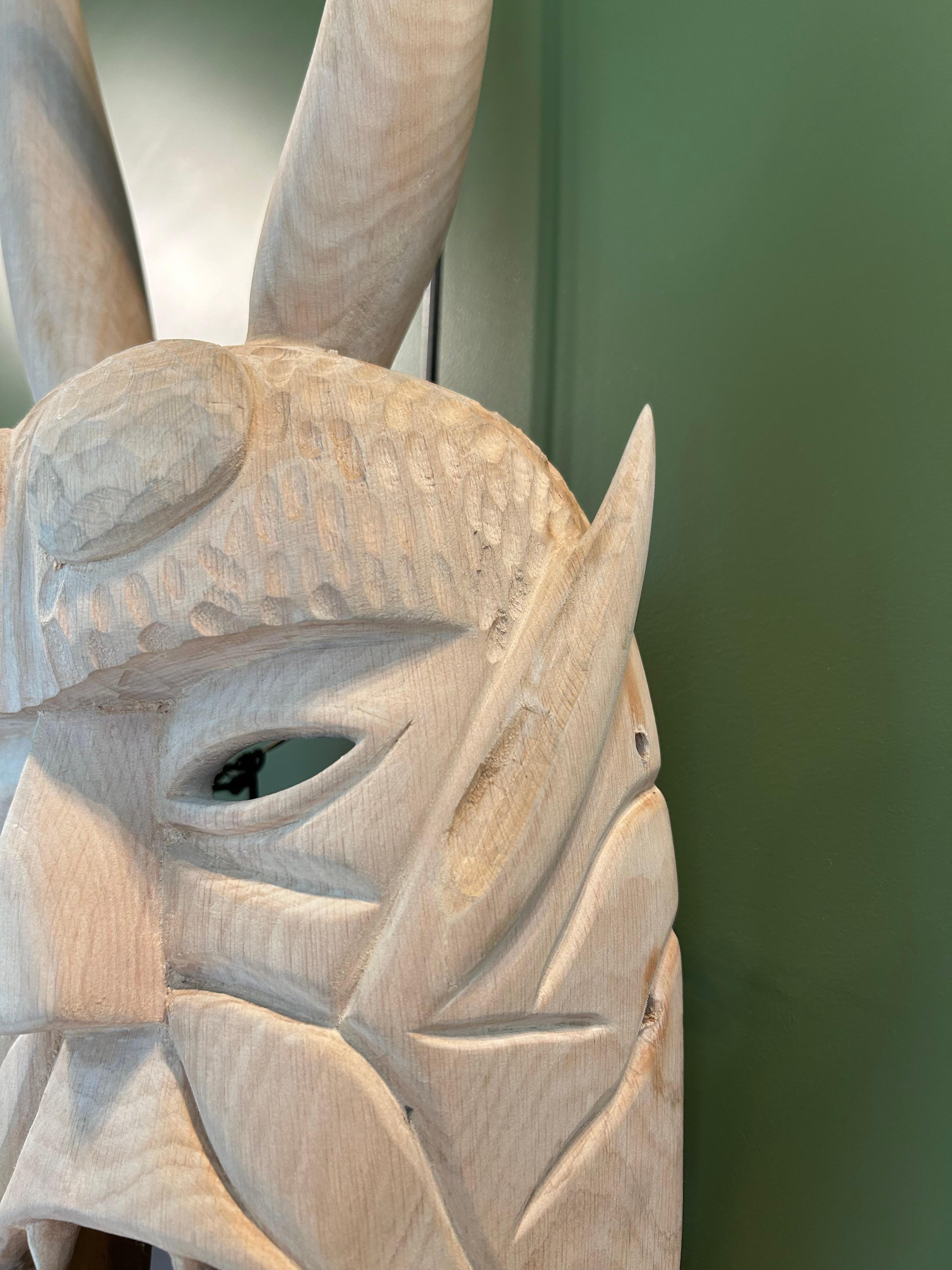 Carved from natural alder wood, this mask depicts a vampire and is typically worn by villagers during the Entrudo festivities. Known as one of Portugal's most traditional Carnivals, the Entrudo of Lazarim boasts an ancient history, surviving even