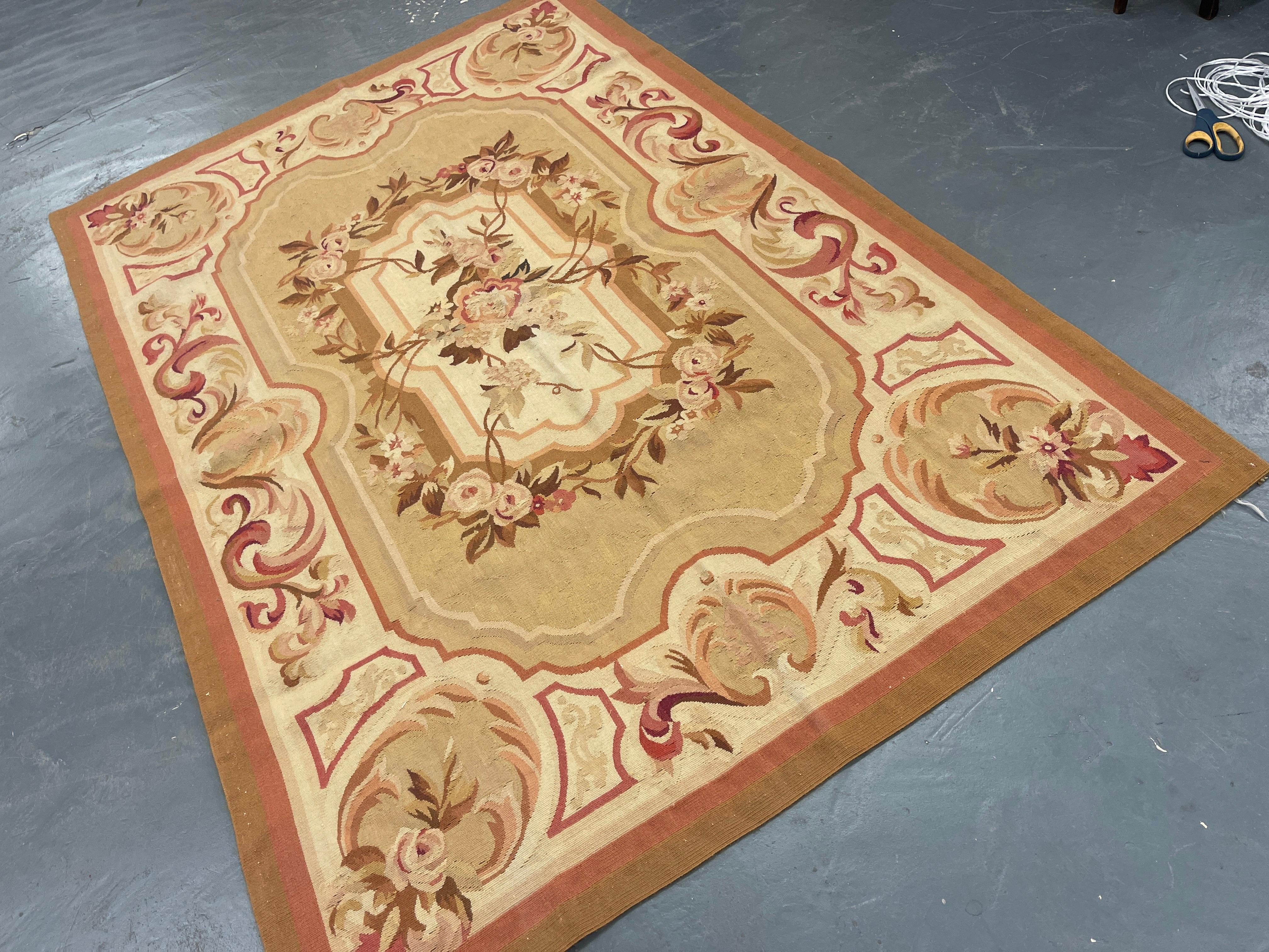 This fantastic area rug has been handwoven with a beautiful symmetrical floral design woven on a golden brown background with cream-green and pink accents. This elegant piece's colour and design make it the perfect accent rug.
This style of rugs is