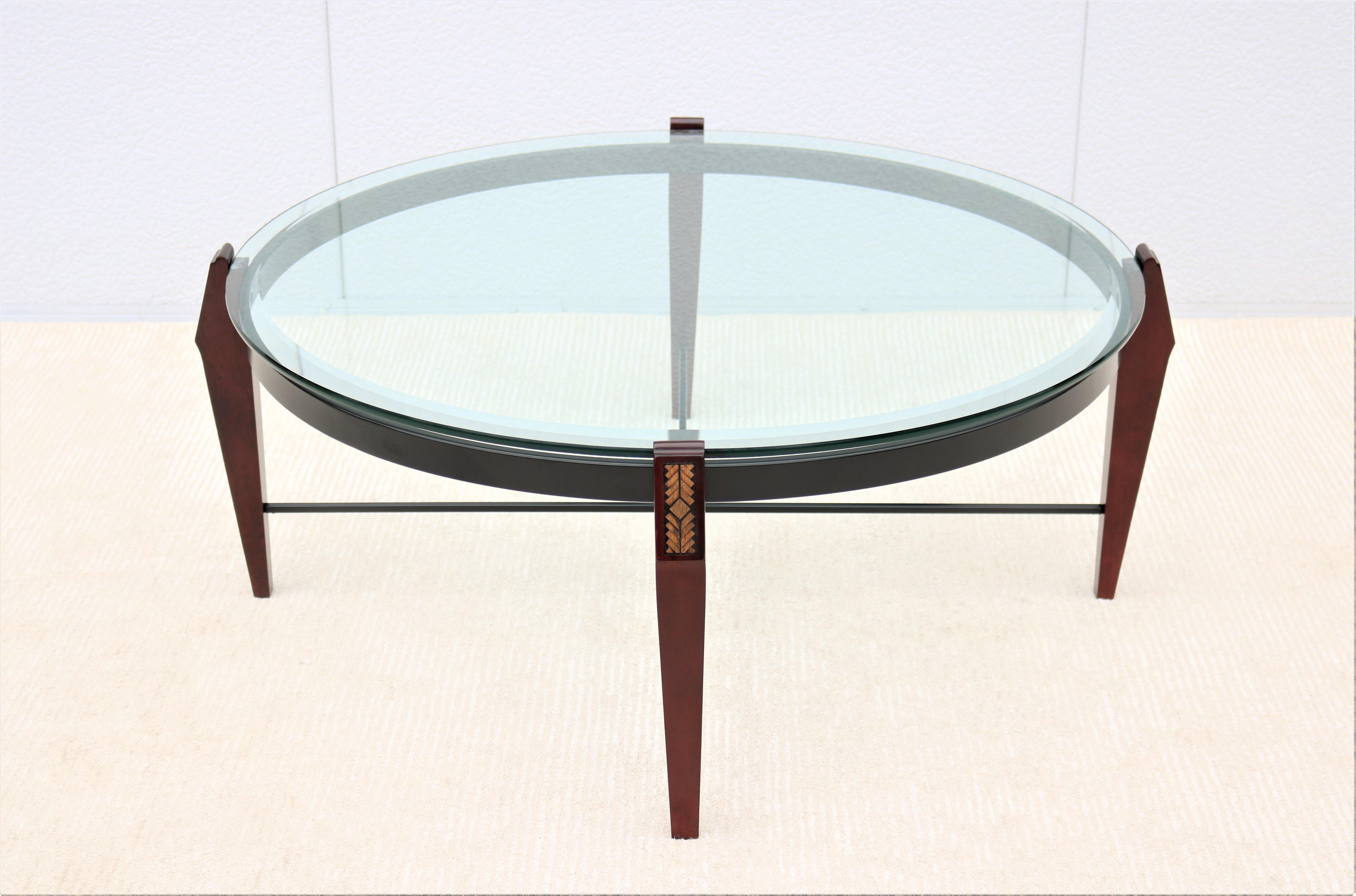 Fabulous vintage traditional round coffee table, inspired by the 18th and 19th century design.
This gorgeous table combines the luxury you desire with the functionality you need.
Features a wood and metal base that sets up the striking profile,