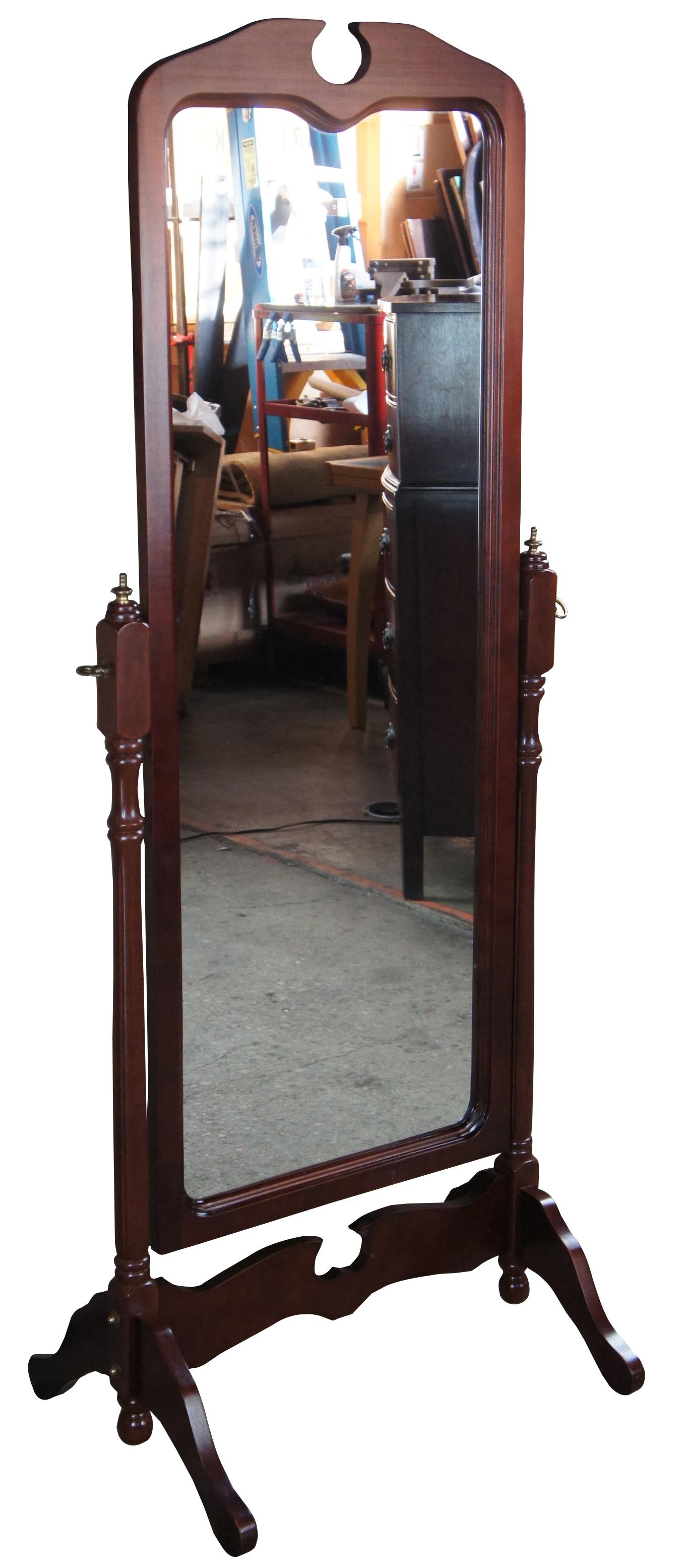 Vintage Cheval mirror with mahogany finish. Features traditional styling and full length.
   