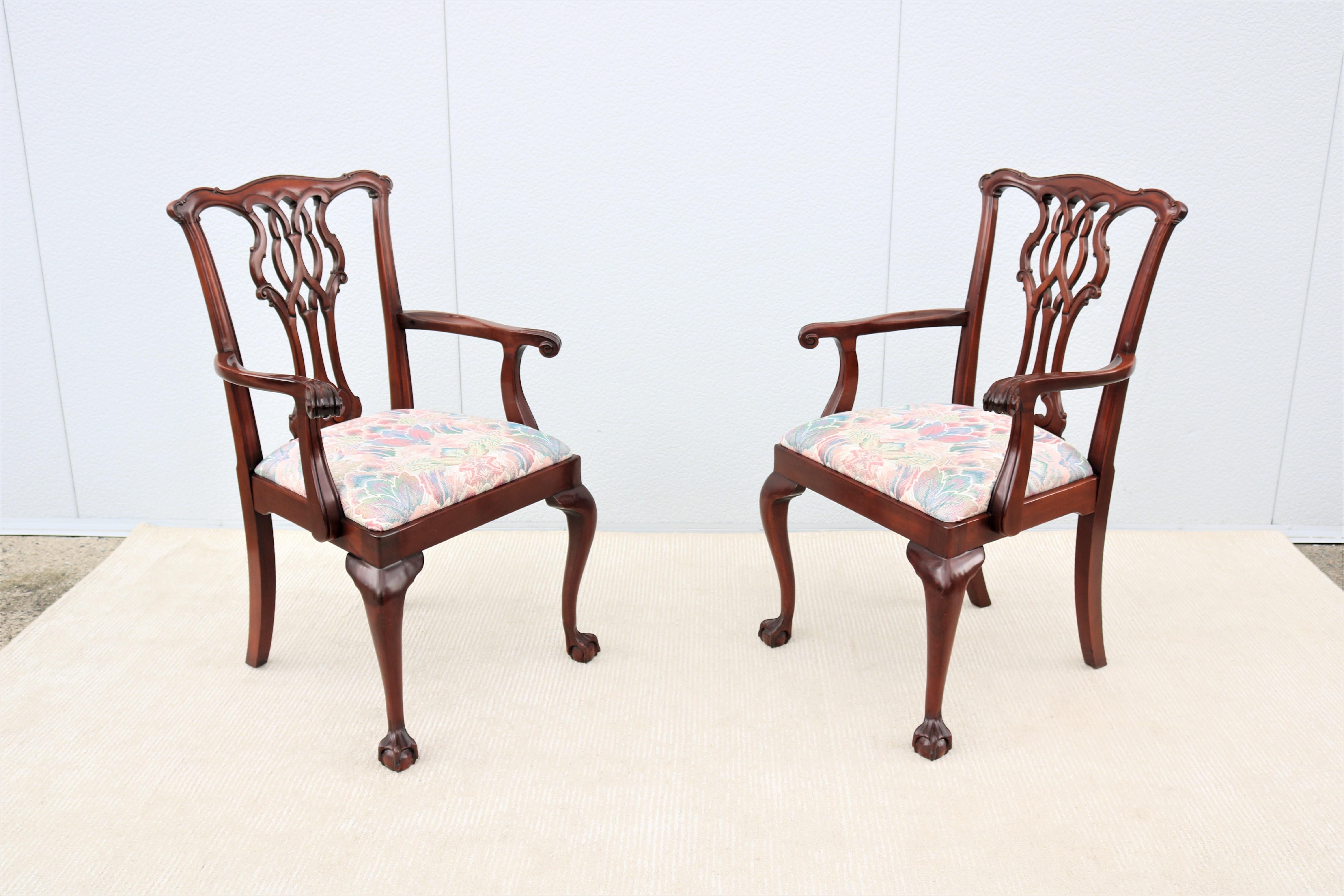 These fabulous traditional classic Chippendale style open armchairs are exceptionally crafted of hand-carved mahogany by skilled artisans using high-quality materials.
Features a shaped top rail above a hand carved and pierced back splat, the
