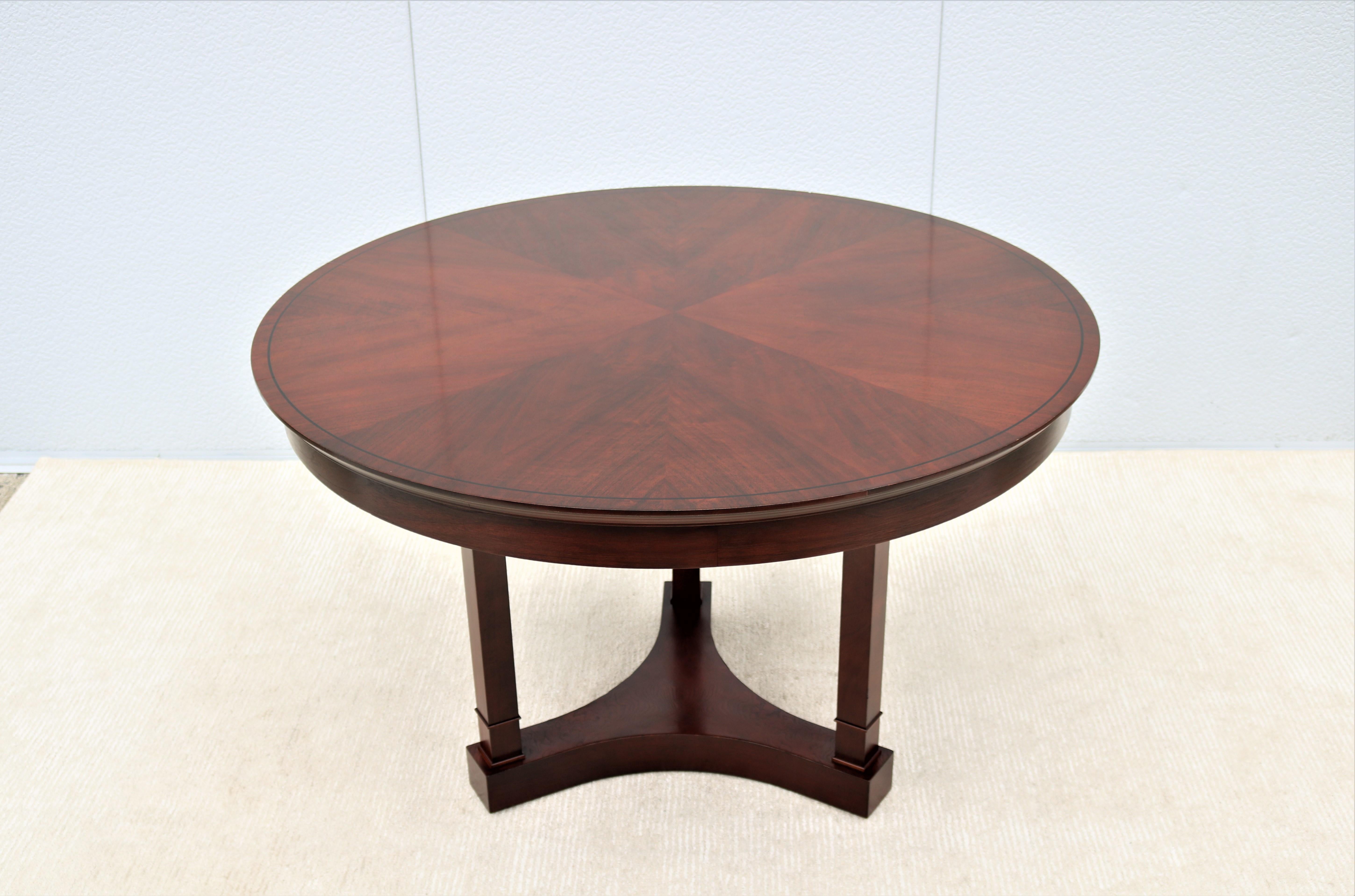 Fabulous Innsbruck and Osterley Park round cherry veneer dining or conference table.
The strength and character of 19th century elegant Biedermeier neo-classic style finds renewed expression in Innsbruck and Osterley Park. 
Michael Tatum and