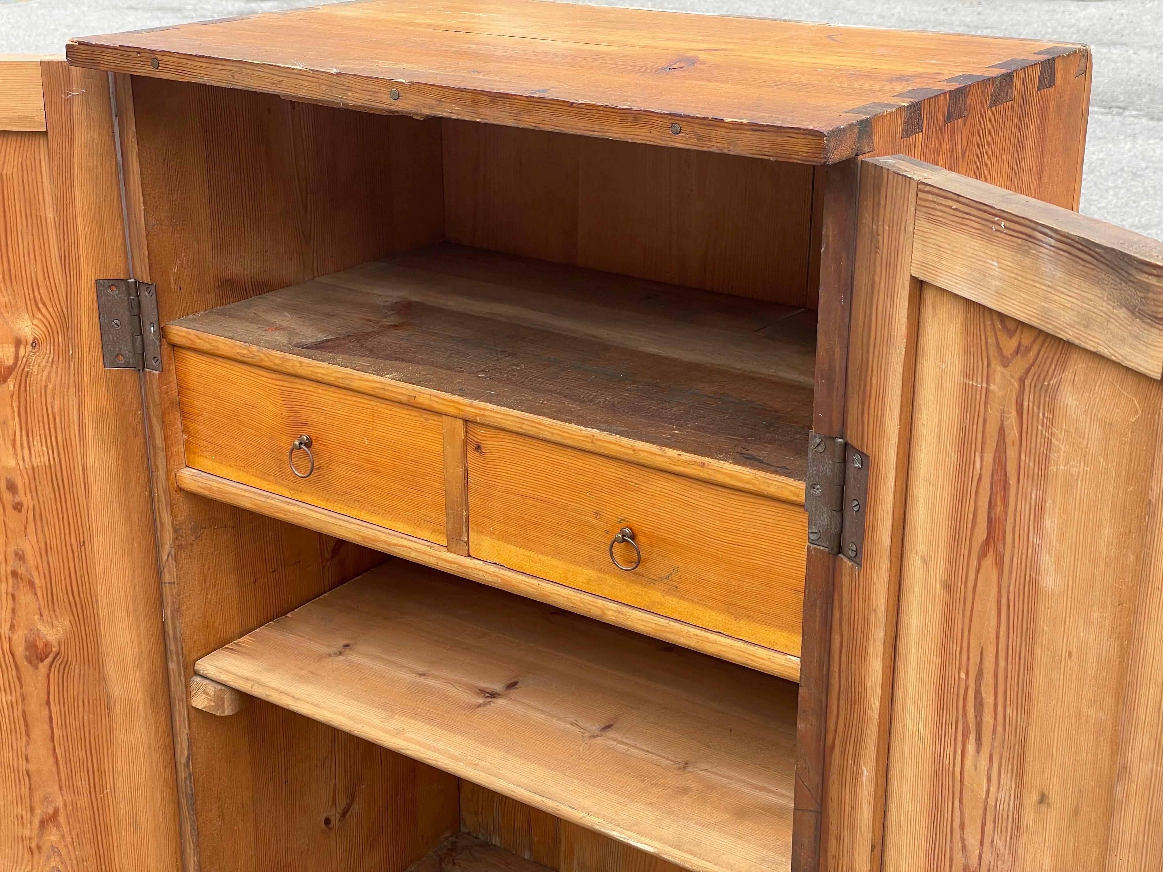 Mid-20th Century Traditional Danish pine cupboard from the 1930s For Sale