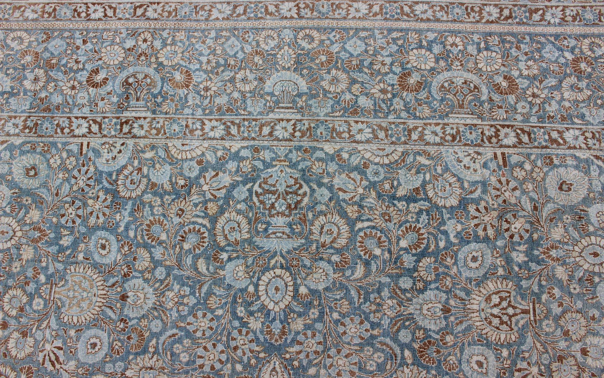 20th Century Antique Hand Knotted Persian Tabriz Rug with Intricate Floral Medallion 