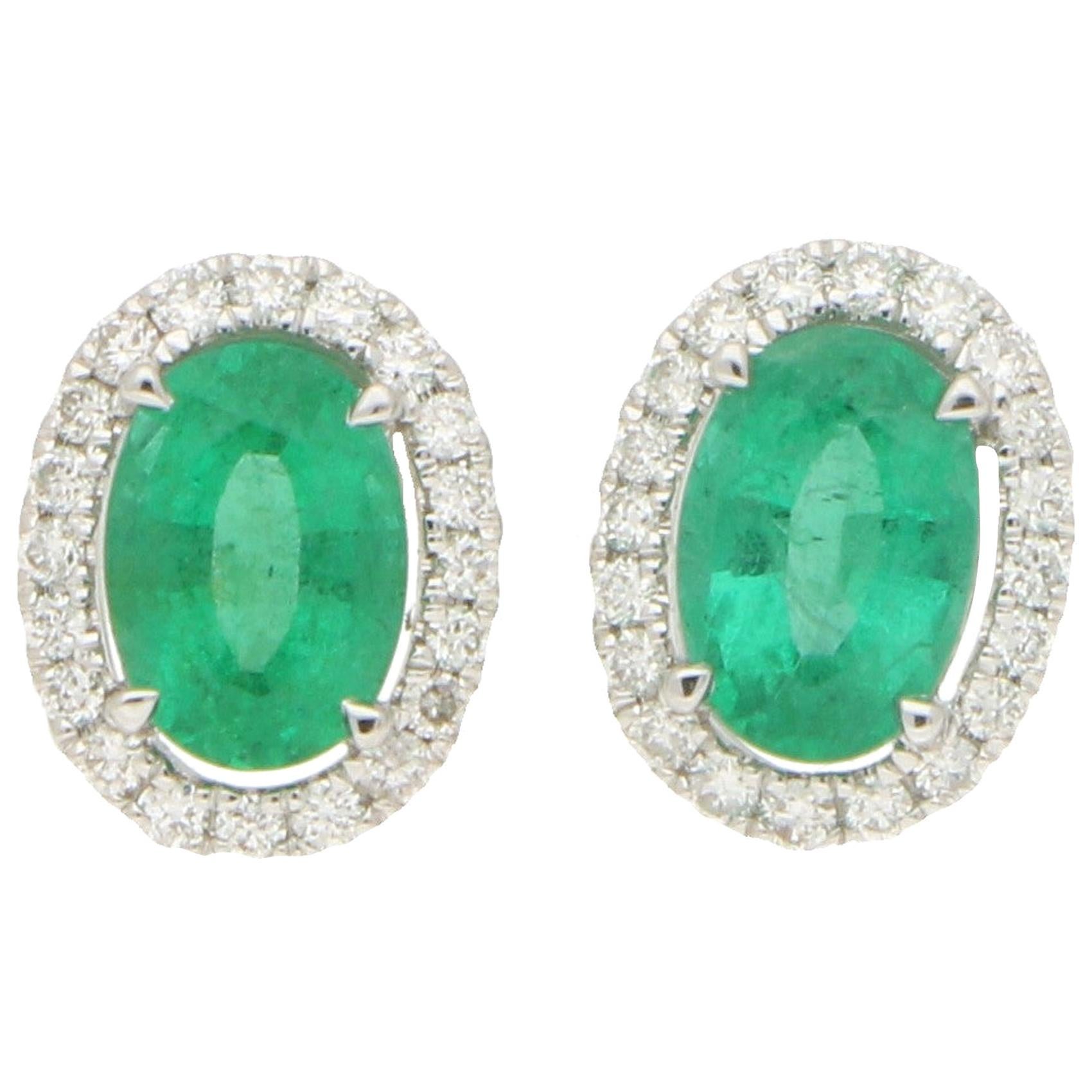 Traditional Emerald and Diamond Cluster Earrings in 18 Karat White Gold