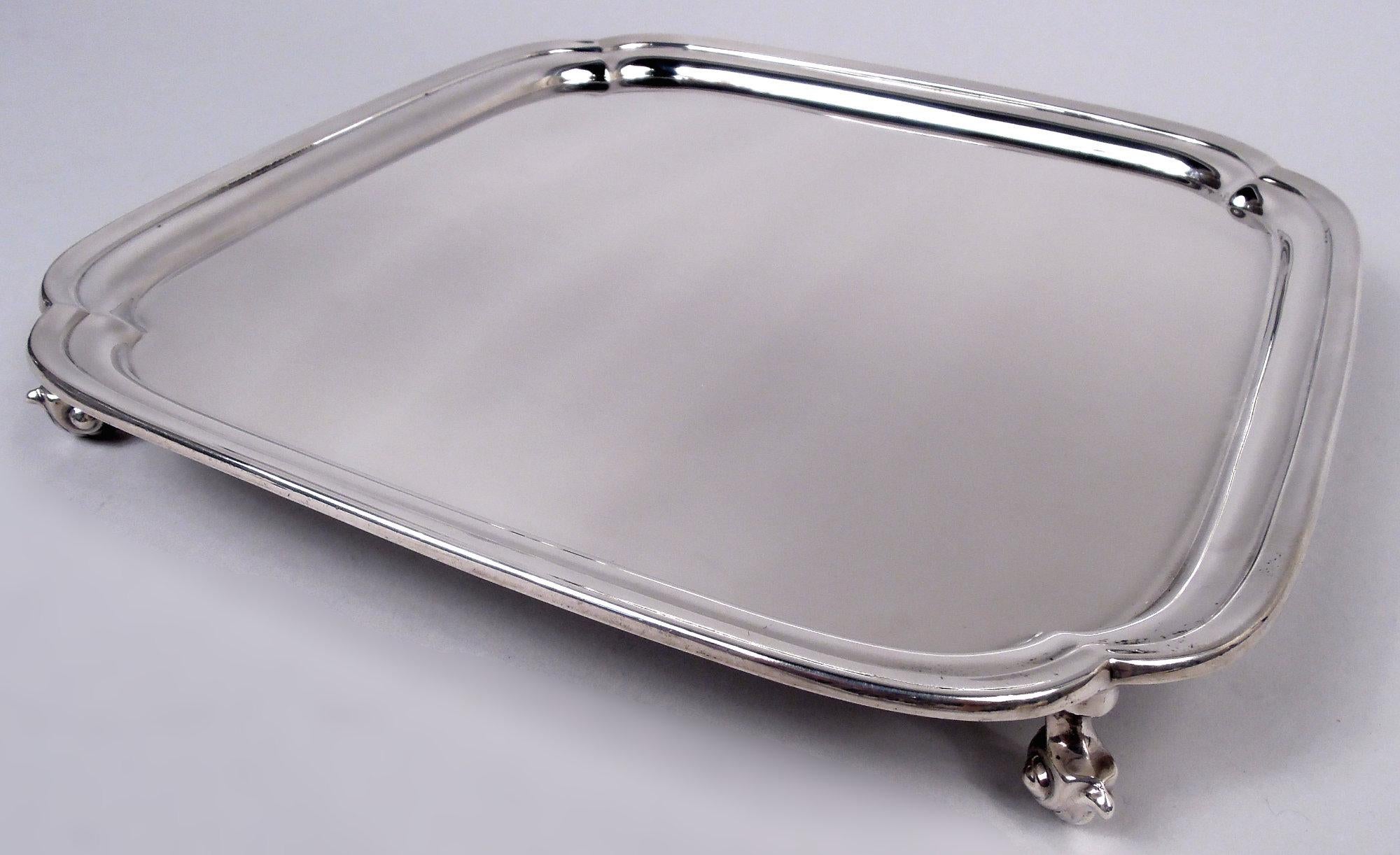 George VI sterling silver salver. Made by Viner’s Ltd in Sheffield in 1950. Square with lobed corners and molded rim. Traditional Georgian from the postwar era. Fully marked including Philadelphia retailer’s stamp (John Wanamaker). Weight: 24.5 troy