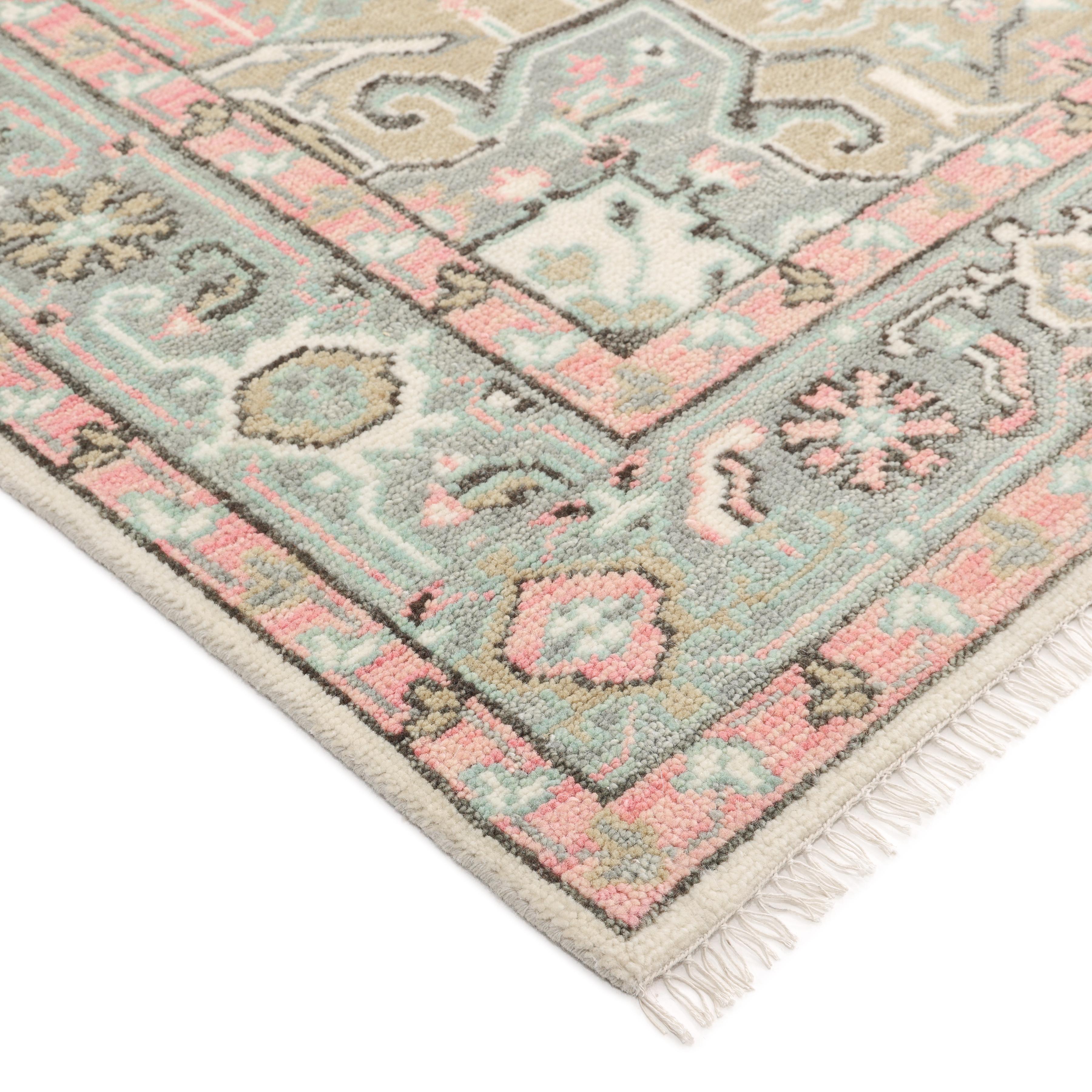 Persian rug-making at its finest inspired the rich colors, elaborate geometric motifs, and botanical detailing of the Serapi collection. With as many as 100 knots per inch, these handcrafted rugs are as durable as they are visually stunning, and