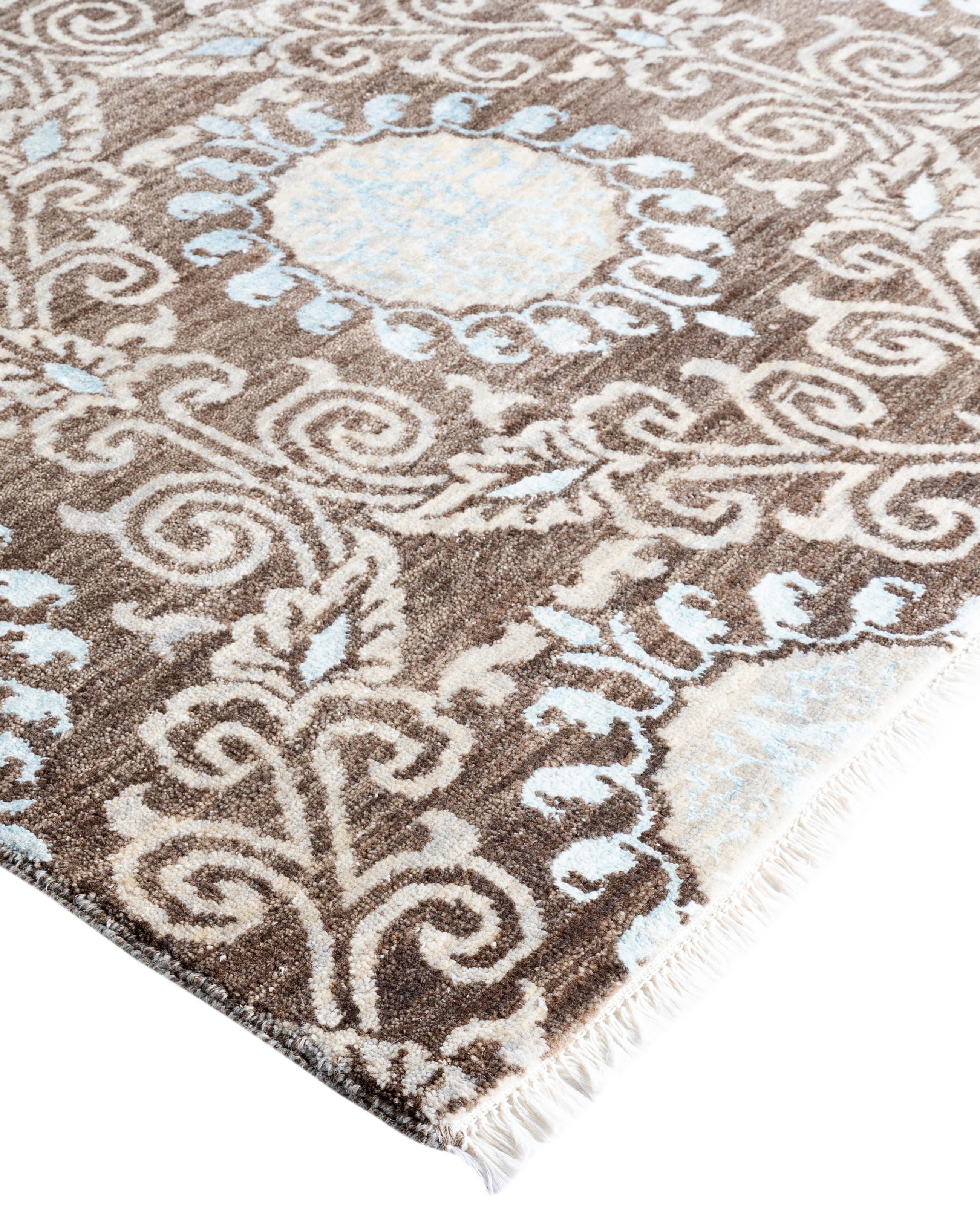 Kazak rugs have been sought after for generations, their unique design aesthetic a captivating combination of tribal history and geographic influence. Intricately hand-knotted from wool, the medallions, allover patterns, and central design reflect