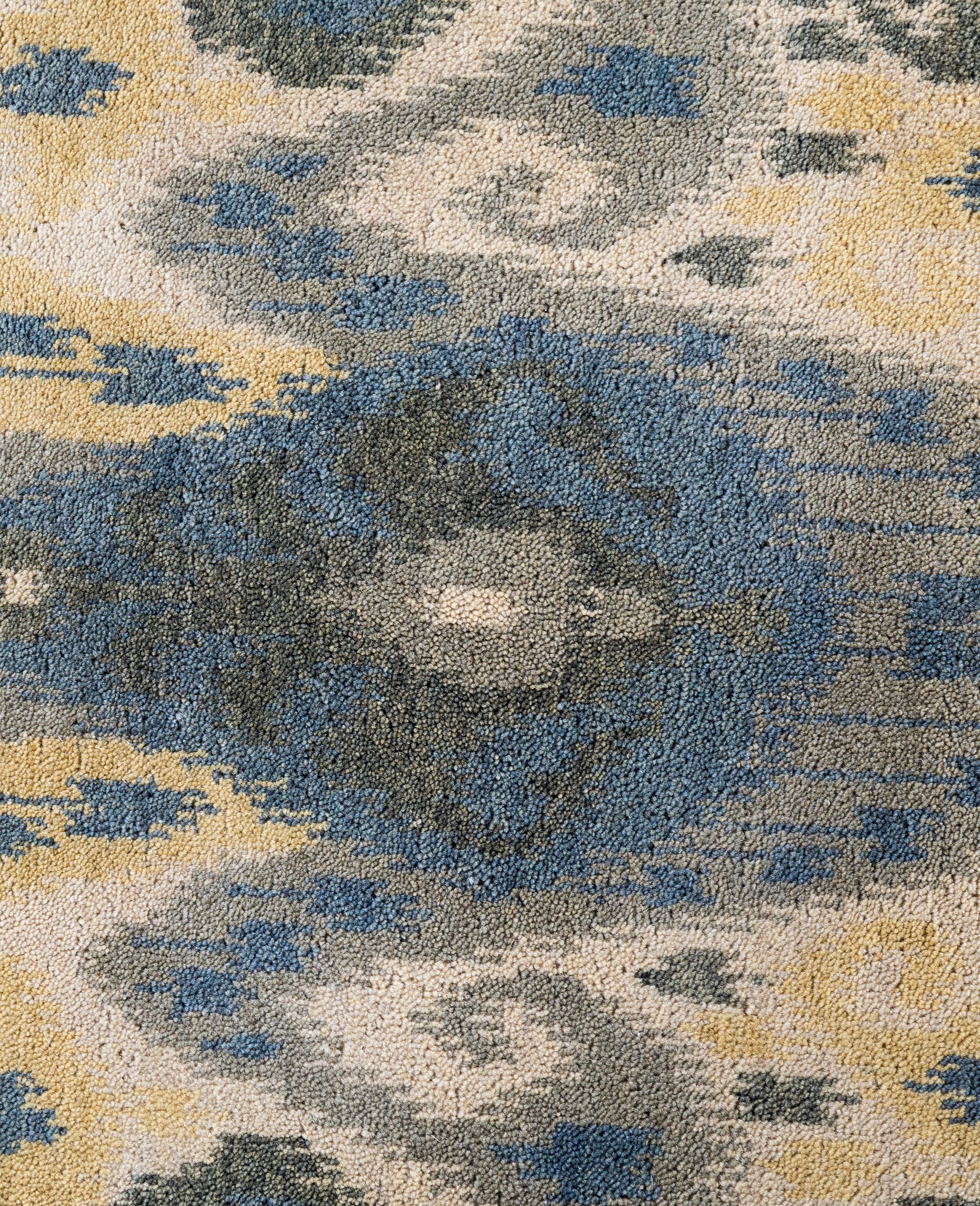 Alfombra geométrica tradicional de lana anudada a mano en color marfil 9' 1