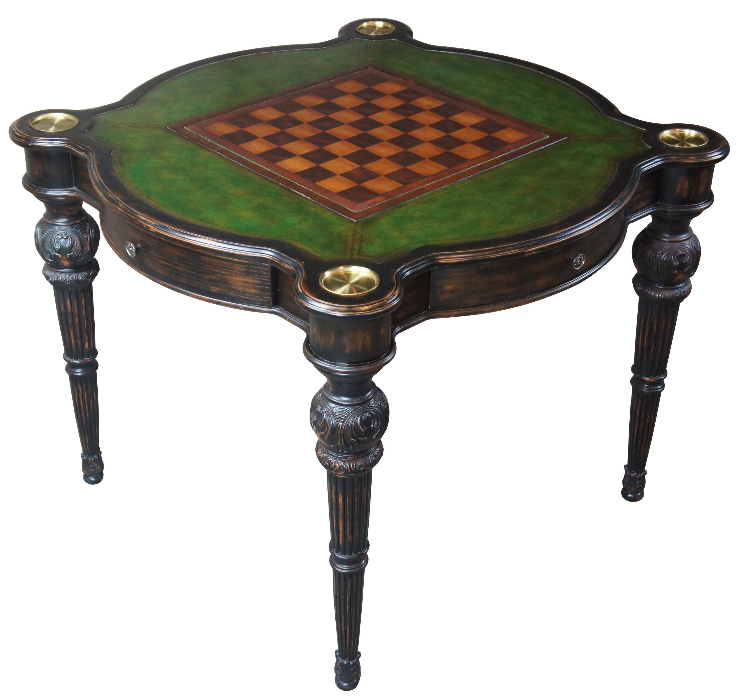 Traditional green tooled leather top game table cards chess poker

Traditional game / chess table. Finished in black with brown undertones. Features four drawers with French hardware, a green tooled leather top with brass cup holders, multiple