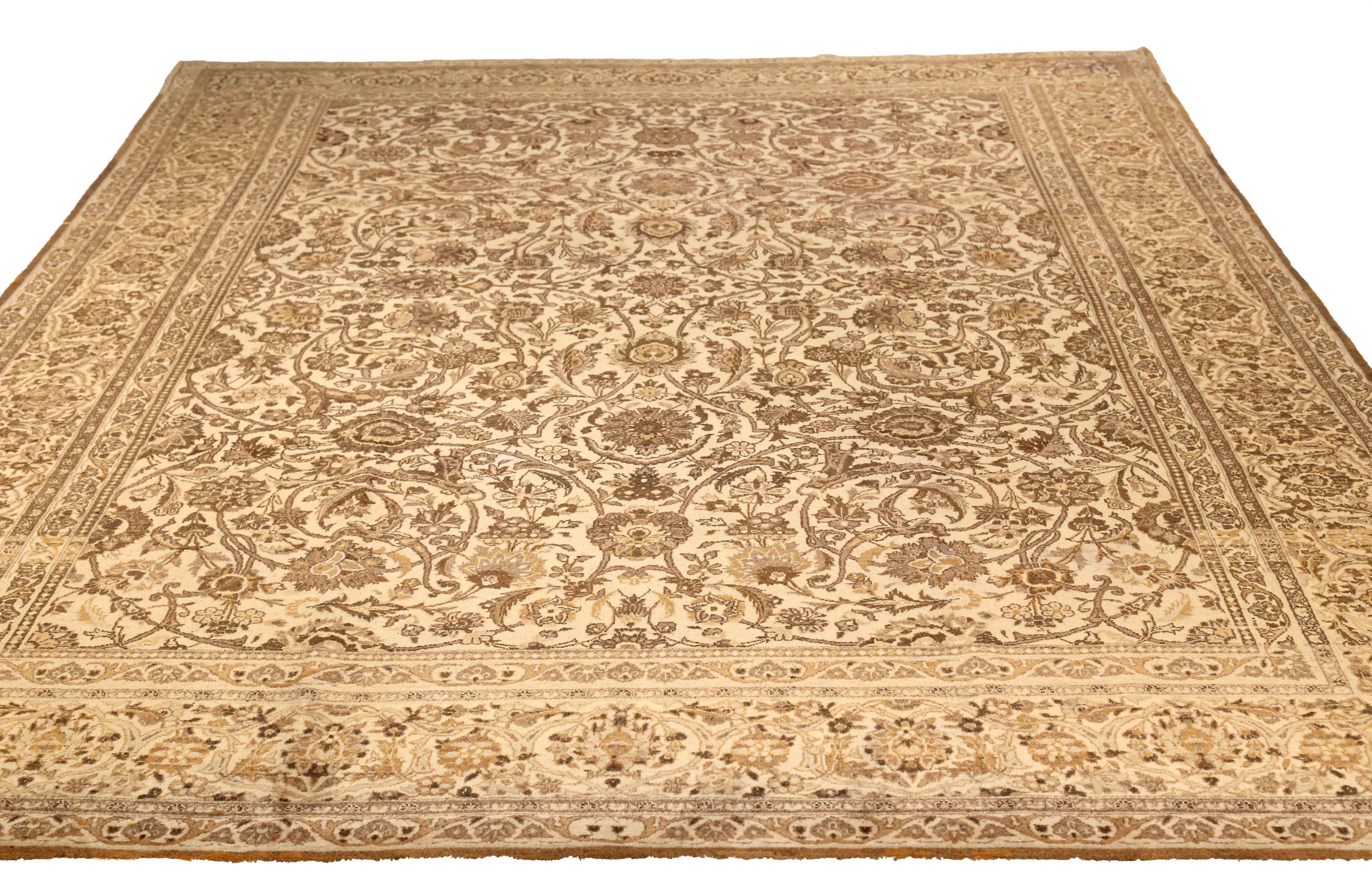 Antique Persian area rug handwoven from the finest sheep’s wool. It’s colored with all-natural vegetable dyes that are safe for humans and pets. It’s a traditional Tabriz design handwoven by expert artisans.

Tabriz is the capital city of East