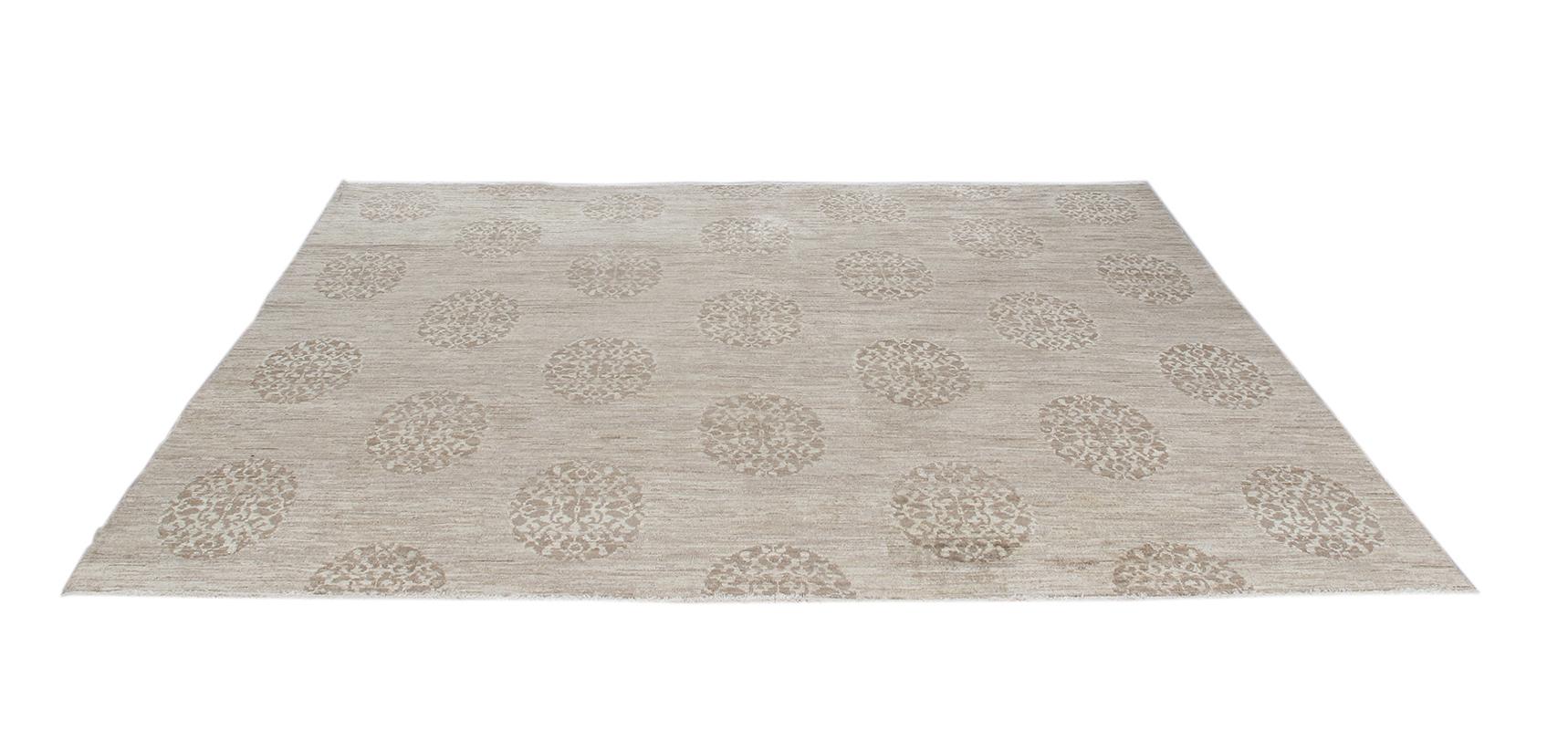 Made in Iran, with the finest hand-carded, hand-spun wool, this hand-knotted rug is designed with a traditional 19th century Tibetan motif by artisan weavers using ancient techniques. Custom sizes and colors available. 
Rug size 8'5